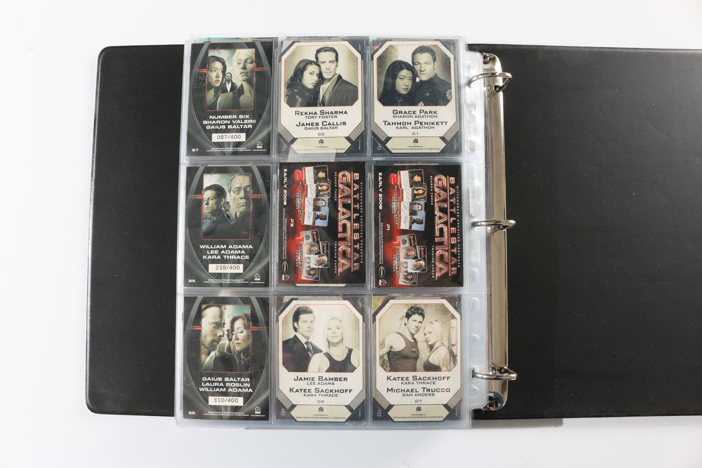 
                  
                    Battlestar Galactica Rittenhouse Trading Cards 246pc LOT with 52 Cards Signed by Edward James Olmos, Mary McDonnell, Katee Sackhoff, Jamie Bamber, James Callis, Tricia Helfer, Grace Park, Michael Hogan, Aaron Douglas, Michael Trucco, & More
                  
                