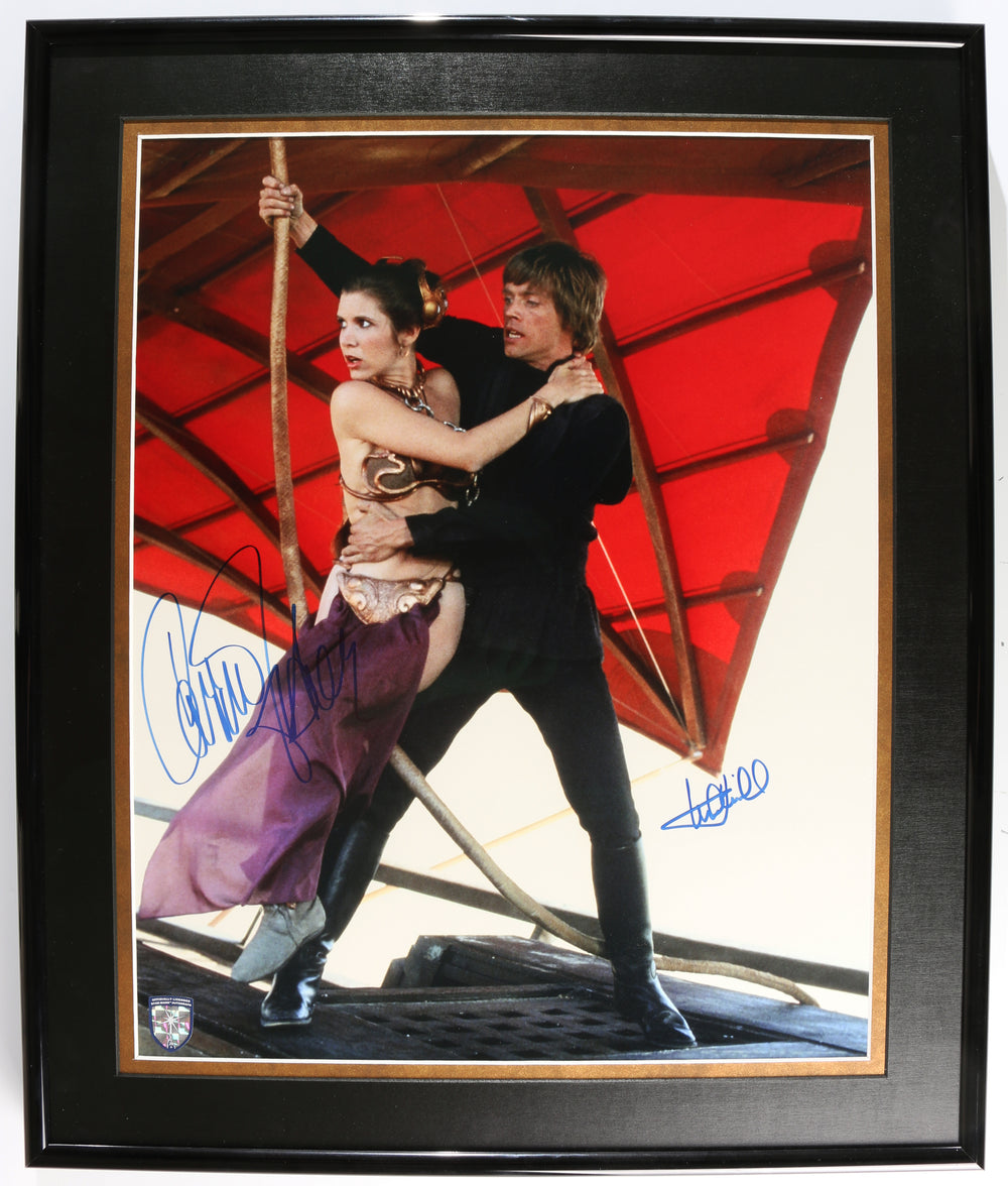 Carrie Fisher as Slave Princess Leia & Mark Hamill as Luke Skywalker in Star Wars: Return of the Jedi (Official Pix Lightsaber Shield) Framed Signed 16x20 Photo