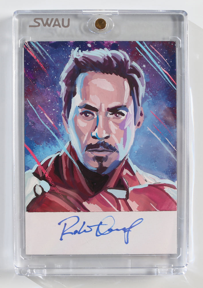 
                  
                    Robert Downey Jr. as Iron Man in Avengers (Encapsulated) Signed SWAU Artist Series Trading Card
                  
                