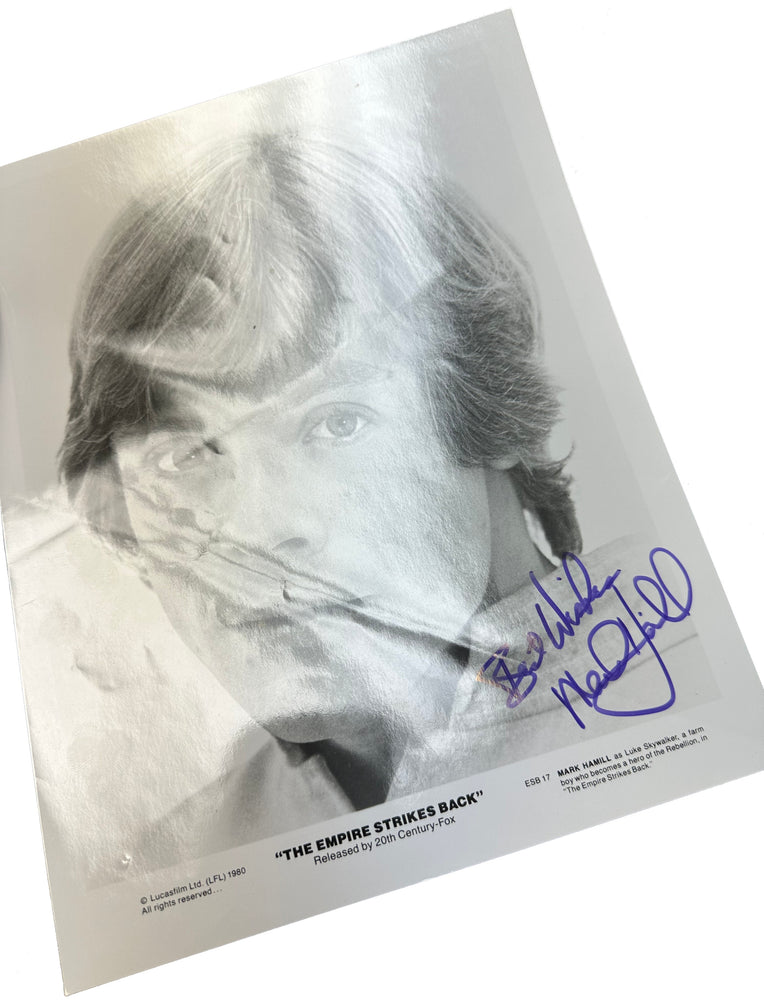 
                  
                    Mark Hamill as Luke Skywalker in Star Wars: The Empire Strikes Back Signed 8x10 Vintage Press Photo
                  
                