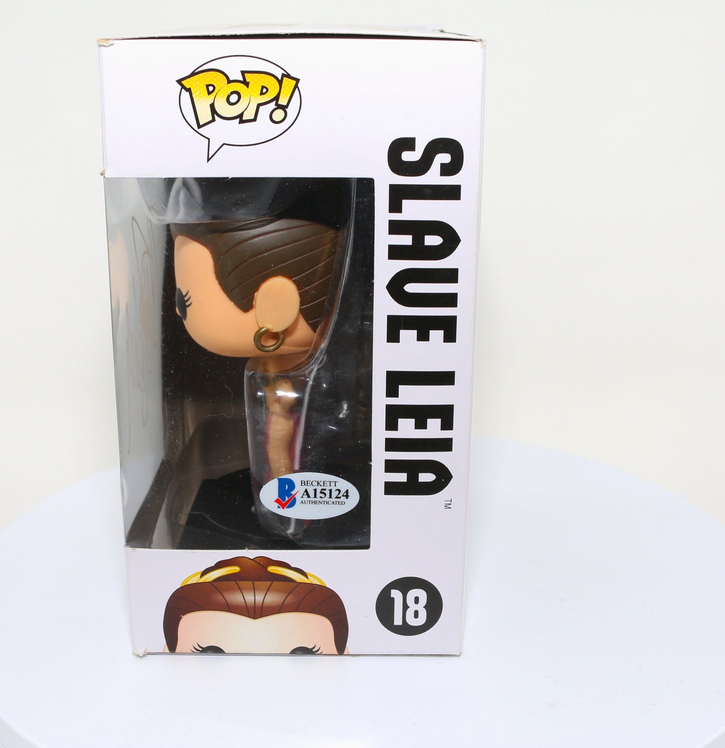 
                  
                    Carrie Fisher as Slave Princess Leia in Star Wars: Return of the Jedi (Radtke) Signed Funko POP! #18
                  
                