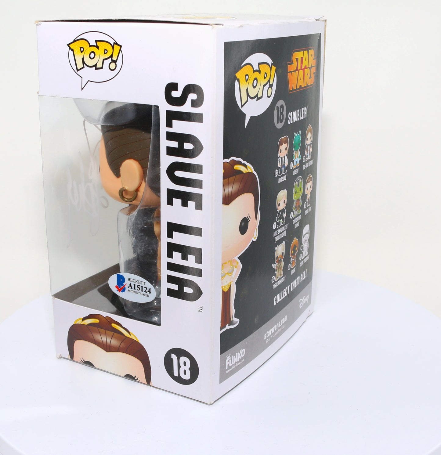 
                  
                    Carrie Fisher as Slave Princess Leia in Star Wars: Return of the Jedi (Radtke) Signed Funko POP! #18
                  
                