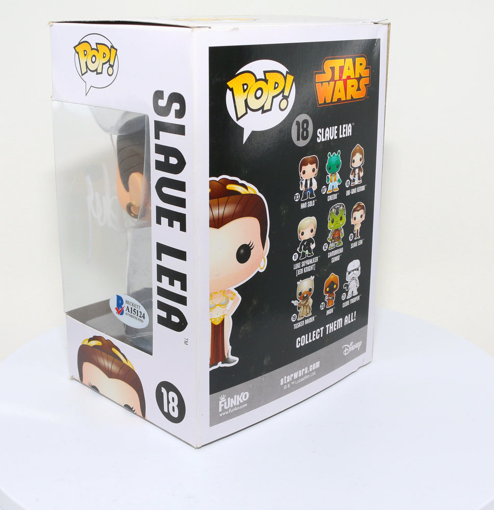 
                  
                    Carrie Fisher as Slave Princess Leia in Star Wars: Return of the Jedi (Radtke) Signed Funko POP! #18
                  
                