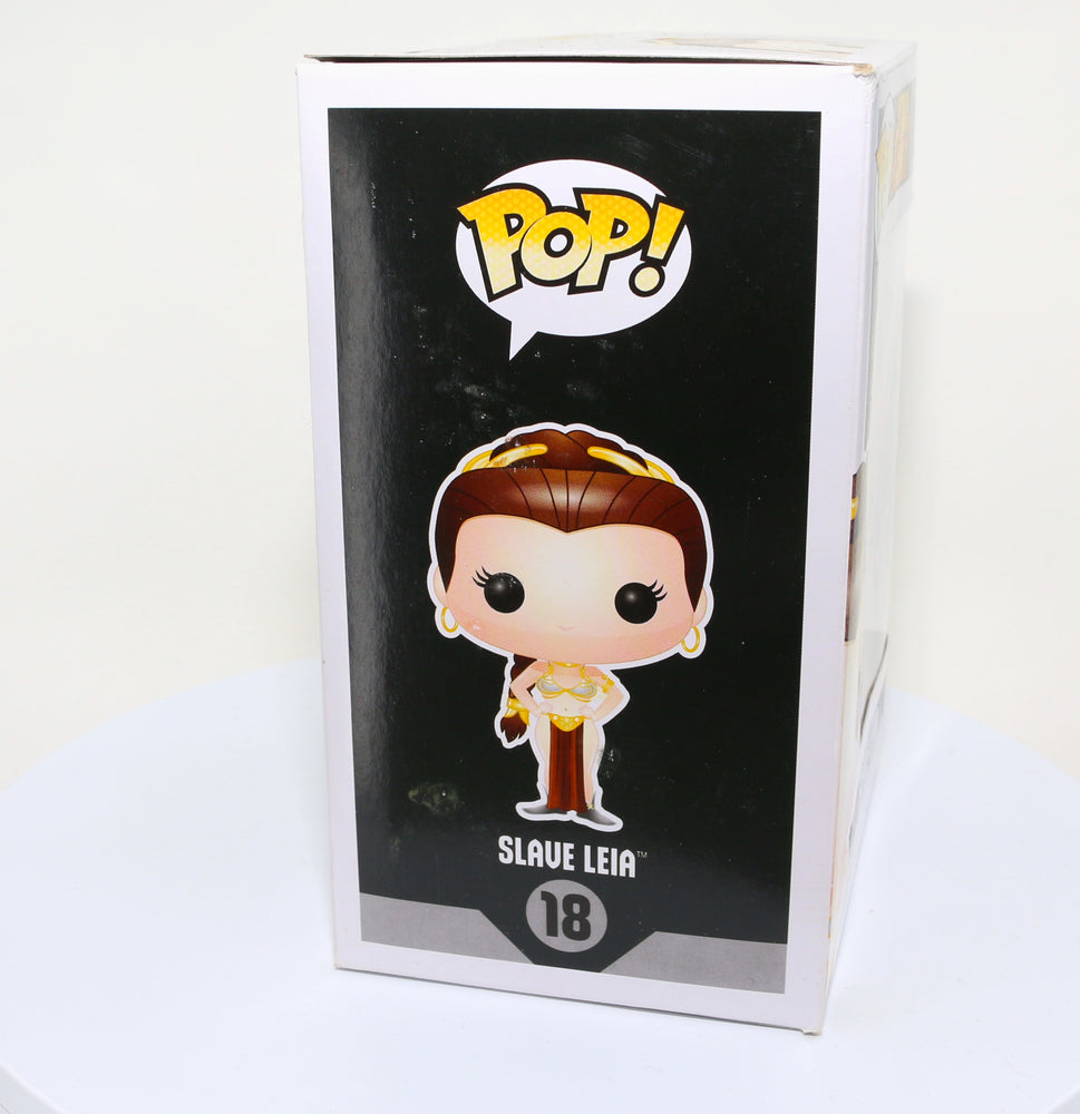 
                  
                    Carrie Fisher as Slave Princess Leia in Star Wars: Return of the Jedi (Radtke) Signed Funko POP! #18
                  
                