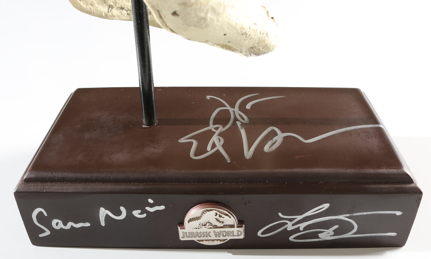 
                  
                    Laura Dern as Ellie Sattler, Jeff Goldblum as Ian Malcolm, & Sam Neill as Alan Grant in Jurassic Park (Celebrity Authentics) Signed Resin Paper Weight T-Rex Skull Replica
                  
                