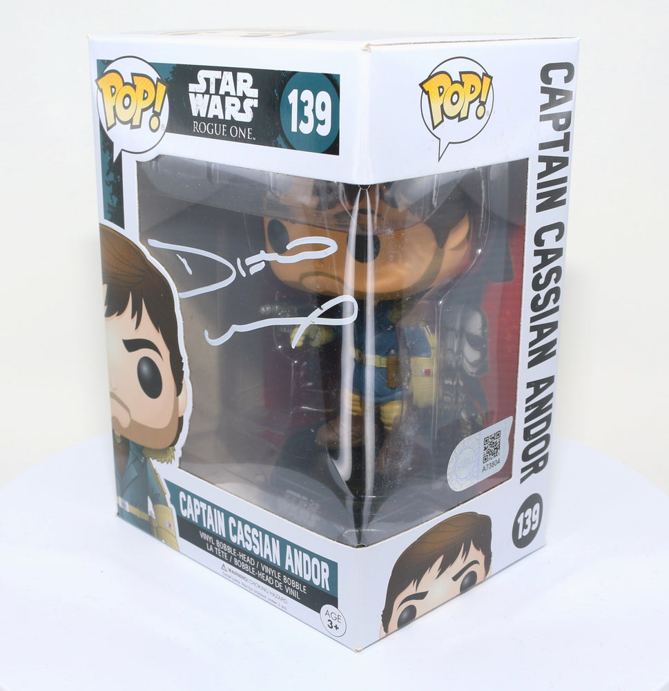 
                  
                    Diego Luna as Captain Cassian Andor in Rogue One: A Star Wars Story Signed Funko POP!  #139
                  
                