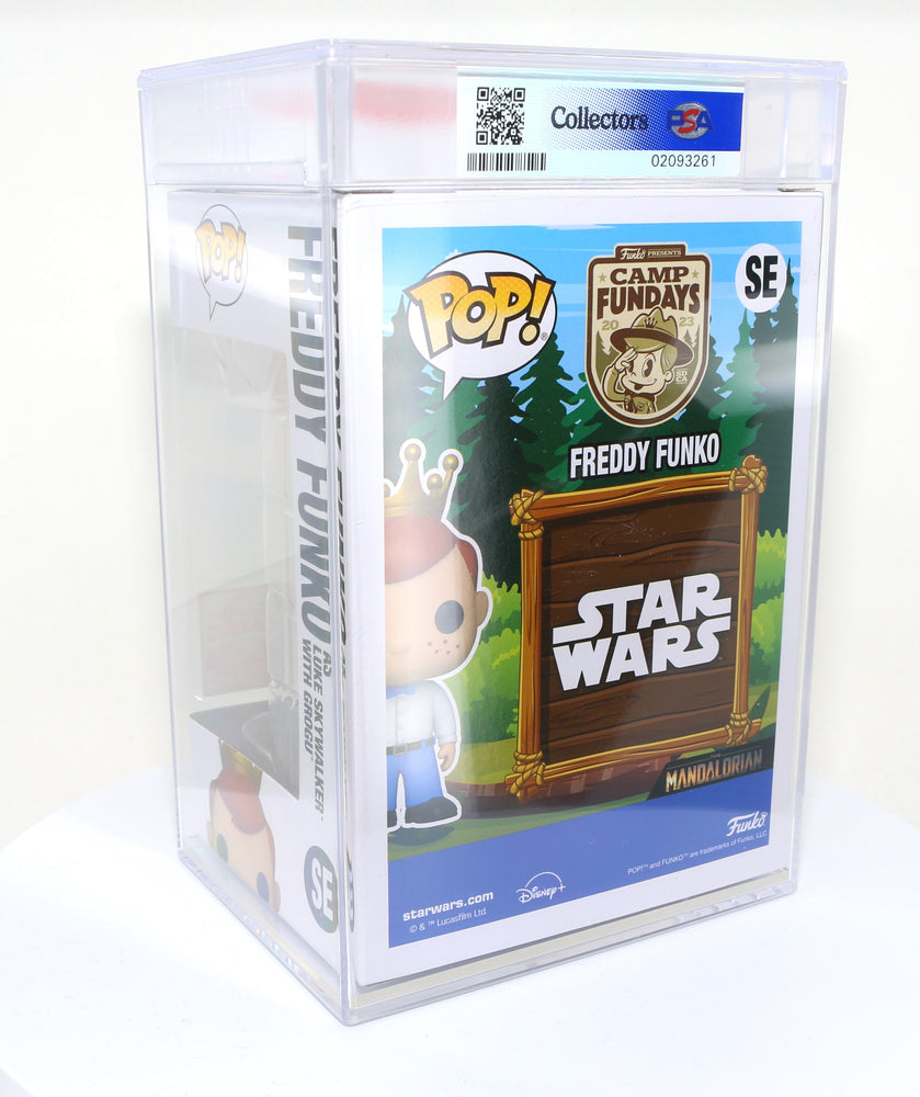 
                  
                    Freddy Funko as Luke Skywalker with Grogu from Star Wars: The Mandalorian 2023 Camp Fundays Exclusive Limited to 4000 Pieces Funko POP! #SE PSA Graded 8.5 - Grail
                  
                