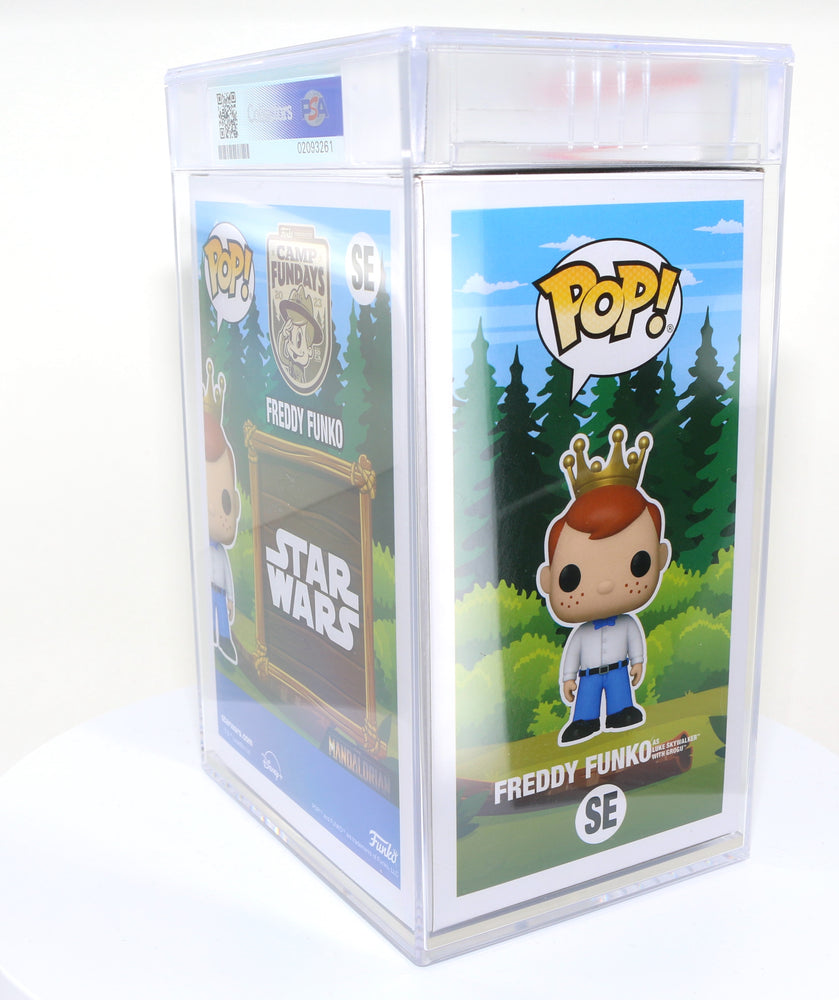 
                  
                    Freddy Funko as Luke Skywalker with Grogu from Star Wars: The Mandalorian 2023 Camp Fundays Exclusive Limited to 4000 Pieces Funko POP! #SE PSA Graded 8.5 - Grail
                  
                