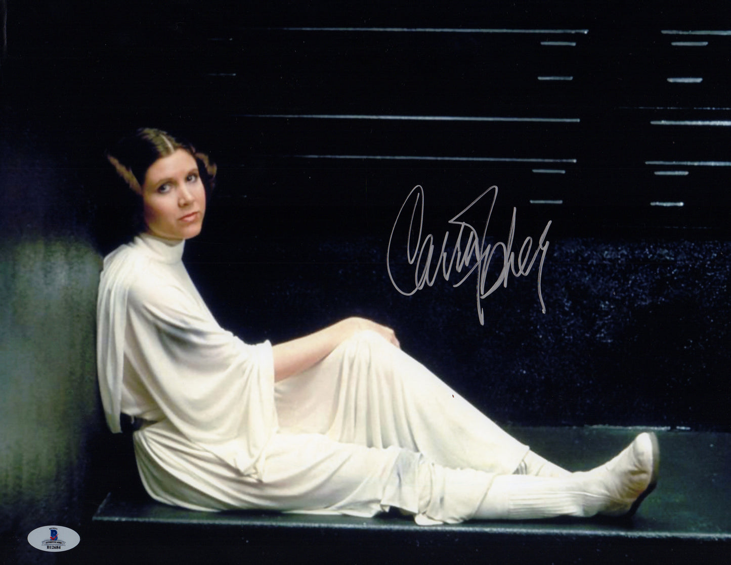
                  
                    Carrie Fisher as Princess Leia in Star Wars: A New Hope Signed 11x14 Photo
                  
                