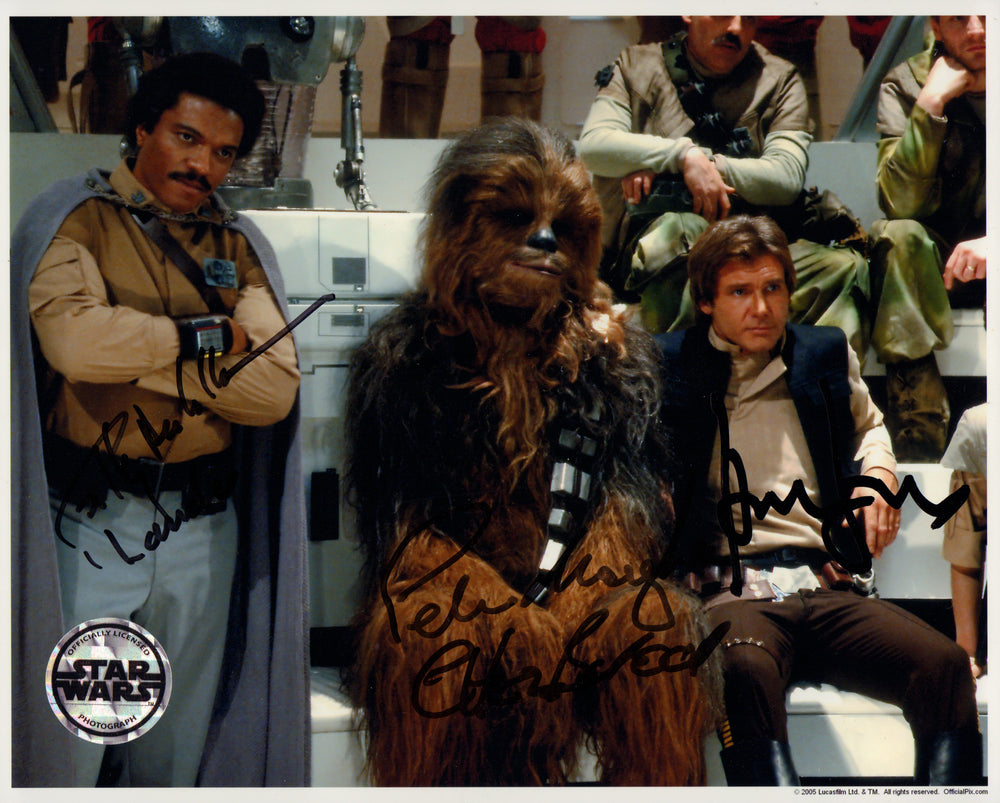 Harrison Ford as Han Solo, Peter Mayhew as Chewbacca, & Billy Dee Williams as Lando in Star Wars: Return of the Jedi Signed 8x10 (Beckett Witnessed / Official Pix) Photo