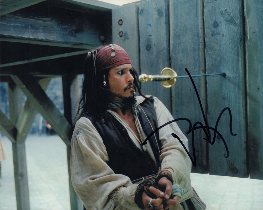 Johnny Depp as Captain Jack Sparrow in Pirates of the Caribbean Signed 8x10 Photo