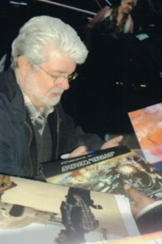 
                  
                    Star Wars: A New Hope 12x9 Program Signed by Creator / Director George Lucas, Composter John Williams, and Stars: Harrison Ford, Mark Hamill, & Carrie Fisher
                  
                