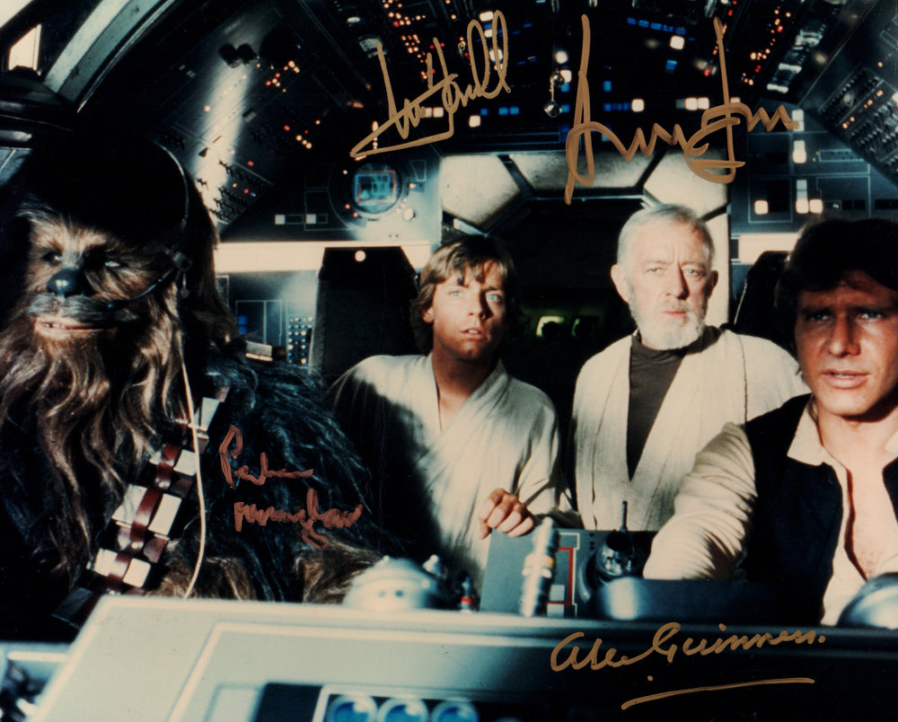 Alec Guinness as Obi-Wan Kenobi, Harrison Ford as Han Solo, Mark Hamill as Luke Skywalker, & Peter Mayhew as Chewbacca in Star Wars: A New Hope Falcon Cockpit (Beckett Witnessed) Signed 8x10 Photo