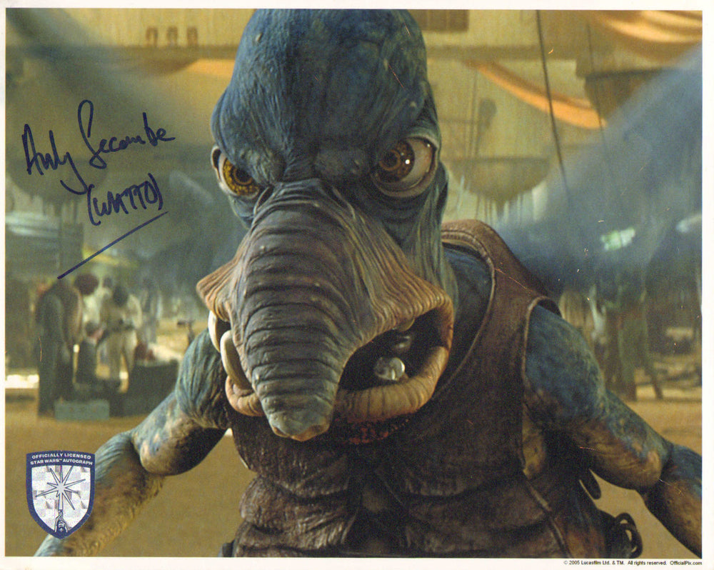 Andy Secombe as Watto in Star Wars Episode I: The Phantom Menace (Official Pix Lightsaber Shield) Signed 8x10 Photo with Character Name