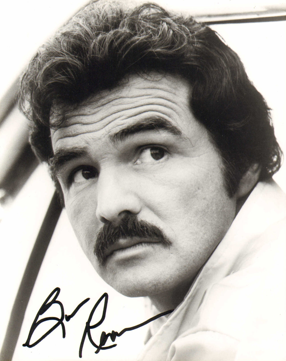 Burt Reynolds as J.J. McClure in The Cannonball Run Signed 8x10 Photo