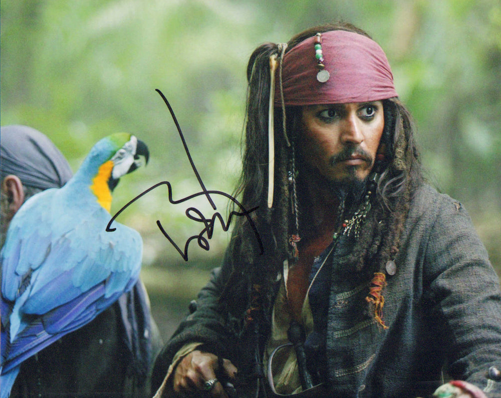 Johnny Depp as Captain Jack Sparrow in Pirates of the Caribbean: Dead Man's Chest Signed 8x10 Photo