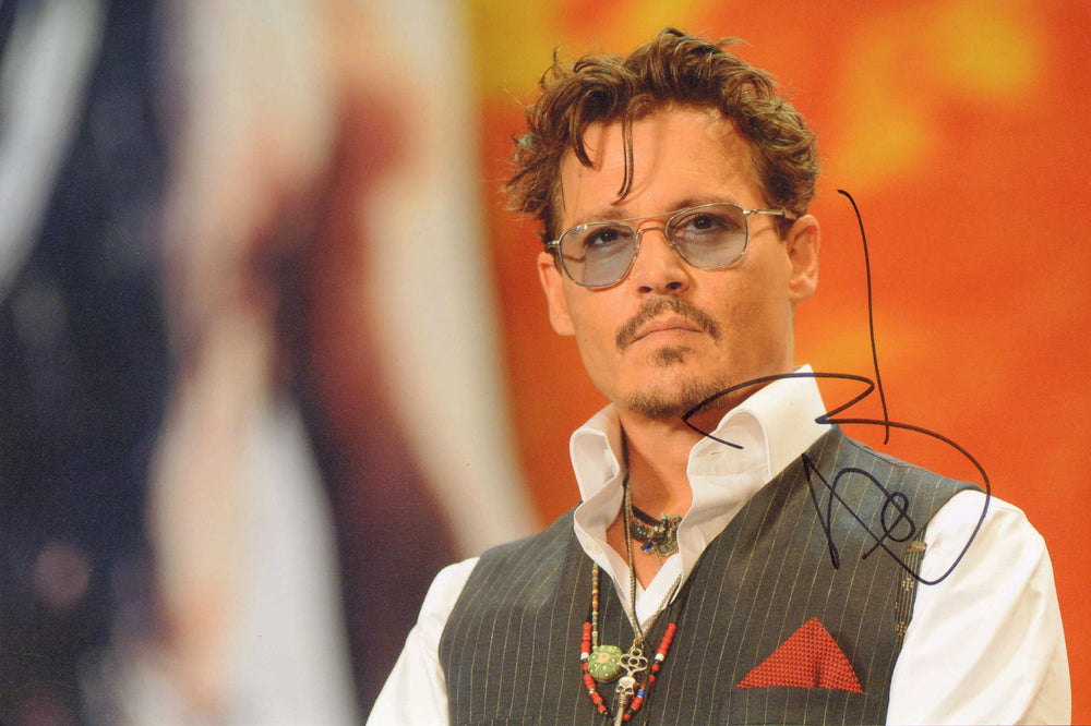 Johnny Depp from Pirates of the Caribbean, A Nightmare on Elm Street, Donnie Brasco, Ed Wood, & Edward Scissorhands Signed 8x12 Photo