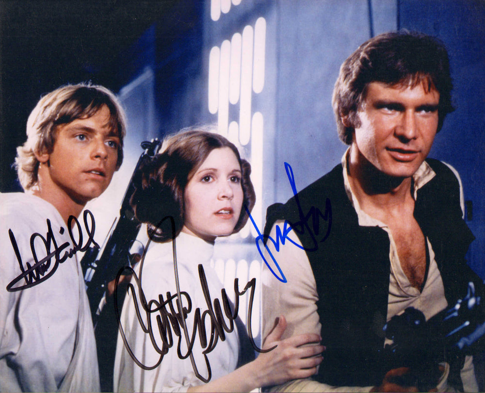Harrison Ford as Han Solo, Carrie Fisher as Princess Leia, & Mark Hamill as Luke Skywalker in Star Wars: A New Hope Signed 8x10 Photo