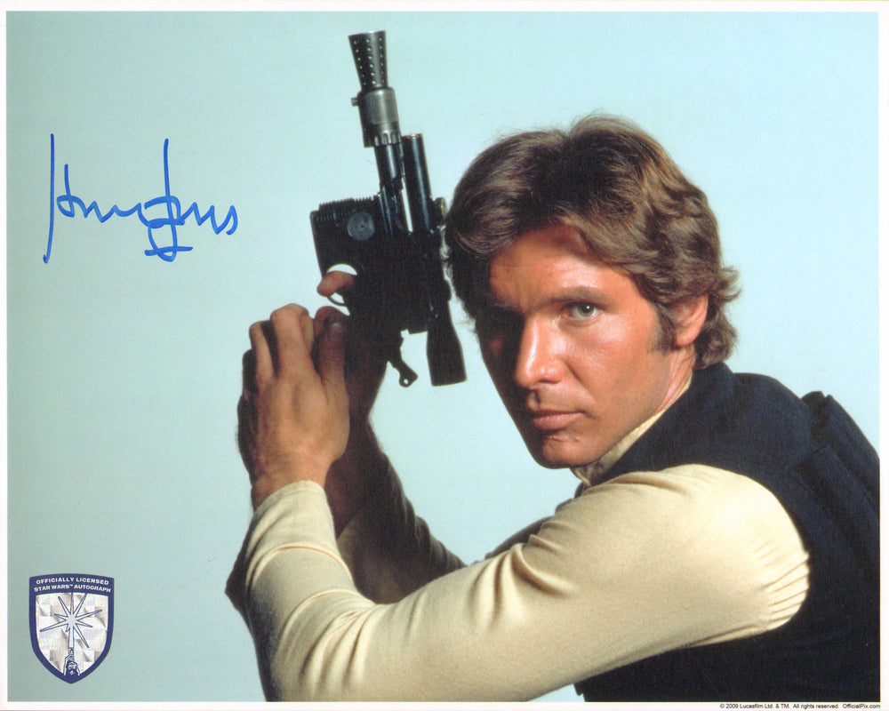 Harrison Ford as Han Solo in Star Wars: A New Hope (Offical Pix Lightsaber Shield) Signed 8x10 Photo