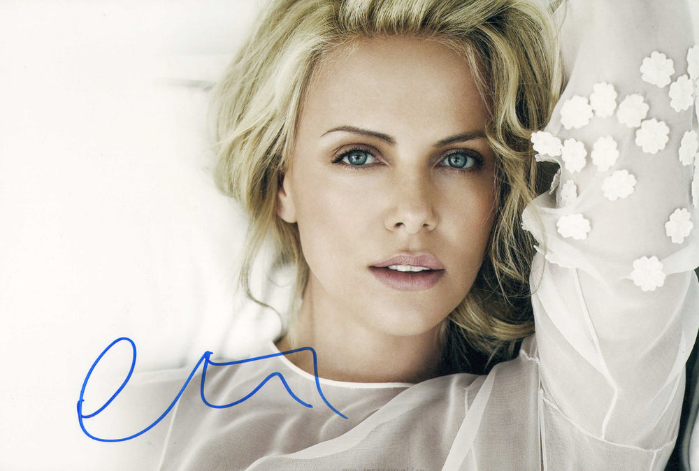 Charlize Theron from Mad Max: Fury Road, Atomic Blonde, Monster, & Bombshell Signed 8x12 Photo