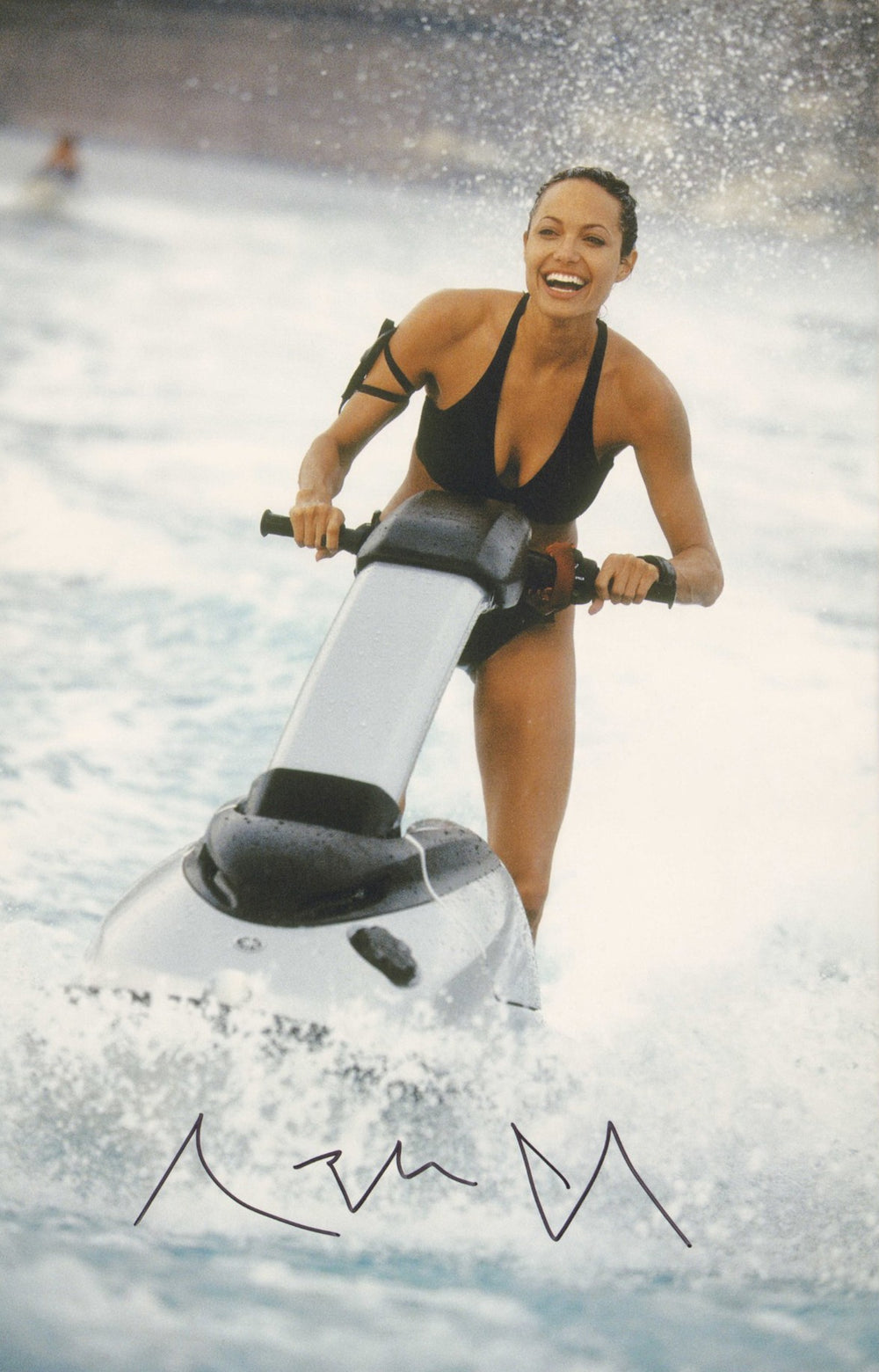 Angelina Jolie as Lara Croft in Tomb Raider: The Cradle of Life Signed 11x17 Photo