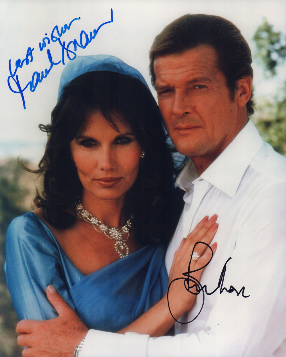 Roger Moore as James Bond with Maud Adams as Octopussy in Octopussy Signed 8x10 Photo