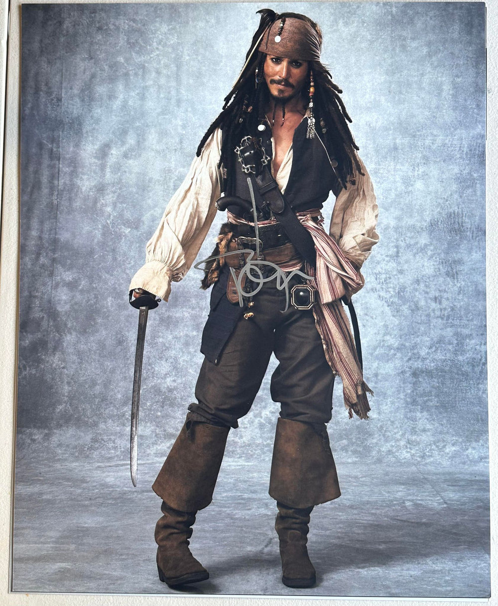 Johnny Depp as Captain Jack Sparrow in Pirates of the Caribbean Signed 16x20 Photo