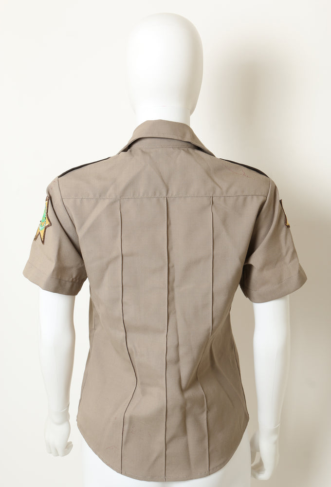 
                  
                    Scream 4 Marley Shelton as Deputy Judy Hicks Production Worn Woodsboro County Sheriff Uniform Shirt Wardrobe - 2012
                  
                
