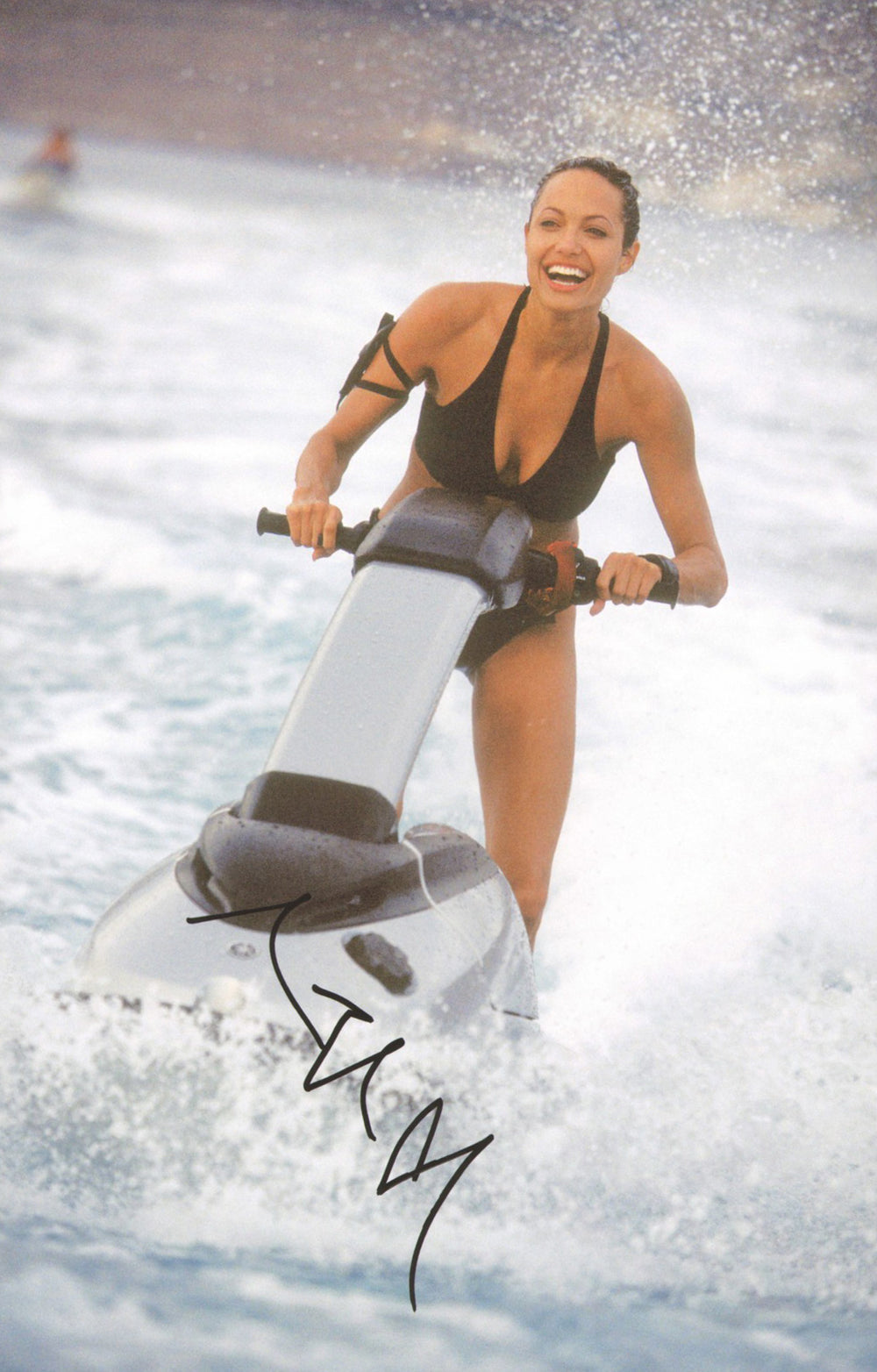 Angelina Jolie as Lara Croft in Tomb Raider: The Cradle of Life Signed 11x17 Photo