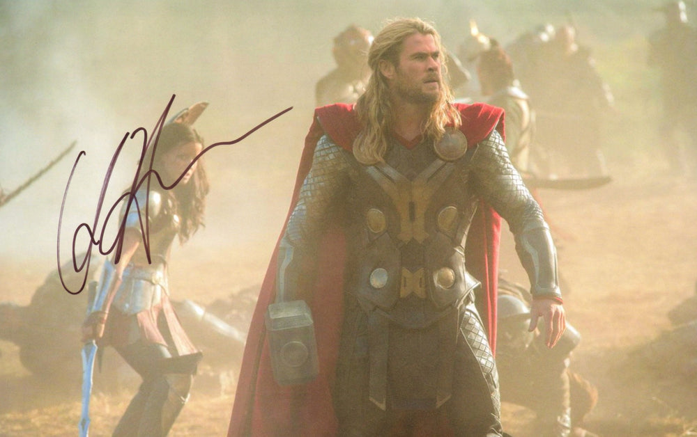 Chris Hemsworth as Thor in Thor: The Dark World Signed 11x17 Photo