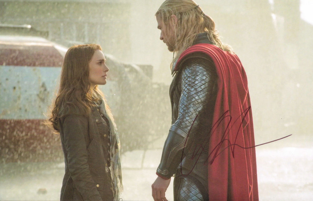 Chris Hemsworth as Thor in Thor: The Dark World Signed 11x17 Photo