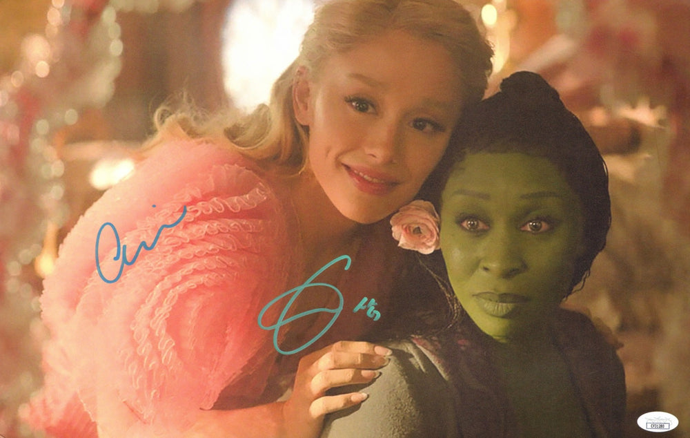Cynthia Erivo as Elphaba Thropp & Ariana Grande as Galinda Upland in Wicked (JSA) Signed 11x17 Photo
