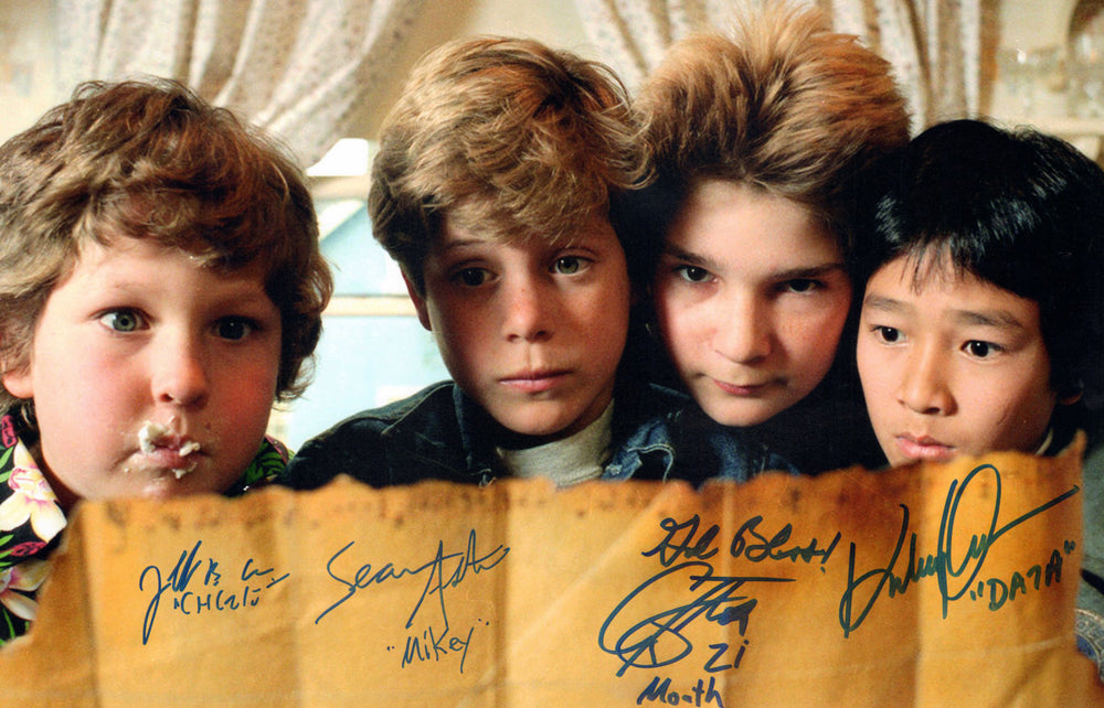 The Goonies (Beckett) 12x18 Photo Cast Signed By Sean Astin, Corey Feldman, Ke Huy Quan, & Jeff Cohen with Character Names
