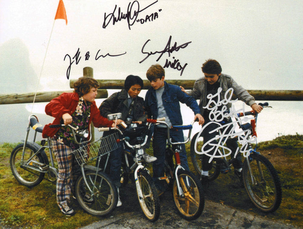 The Goonies 11x14 Photo Cast Signed By Sean Astin, Corey Feldman, Ke Huy Quan, & Jeff Cohen with Character Names